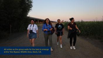 RxOH participants walking through Yolo Bypass Wildlife Refuge to observe the bats at dusk