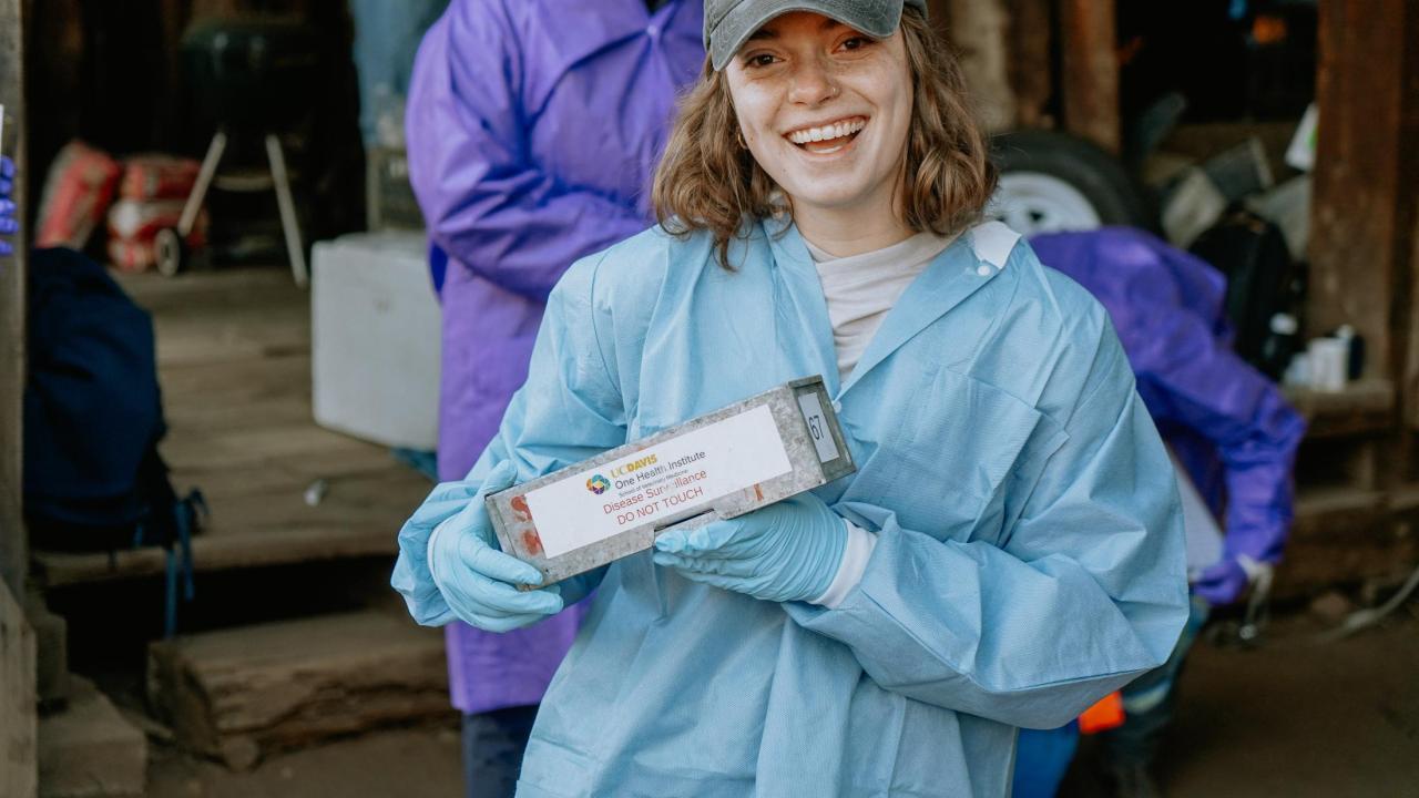 Celeste Snyder holding sherman trap